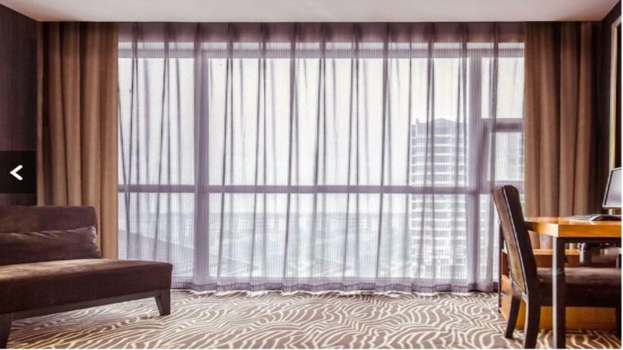 Friend Hui Hotel Жангжиаже Екстериор снимка